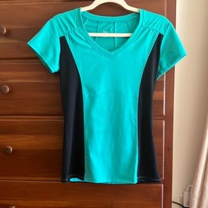 Women’s tennis/workout top by tail size medium